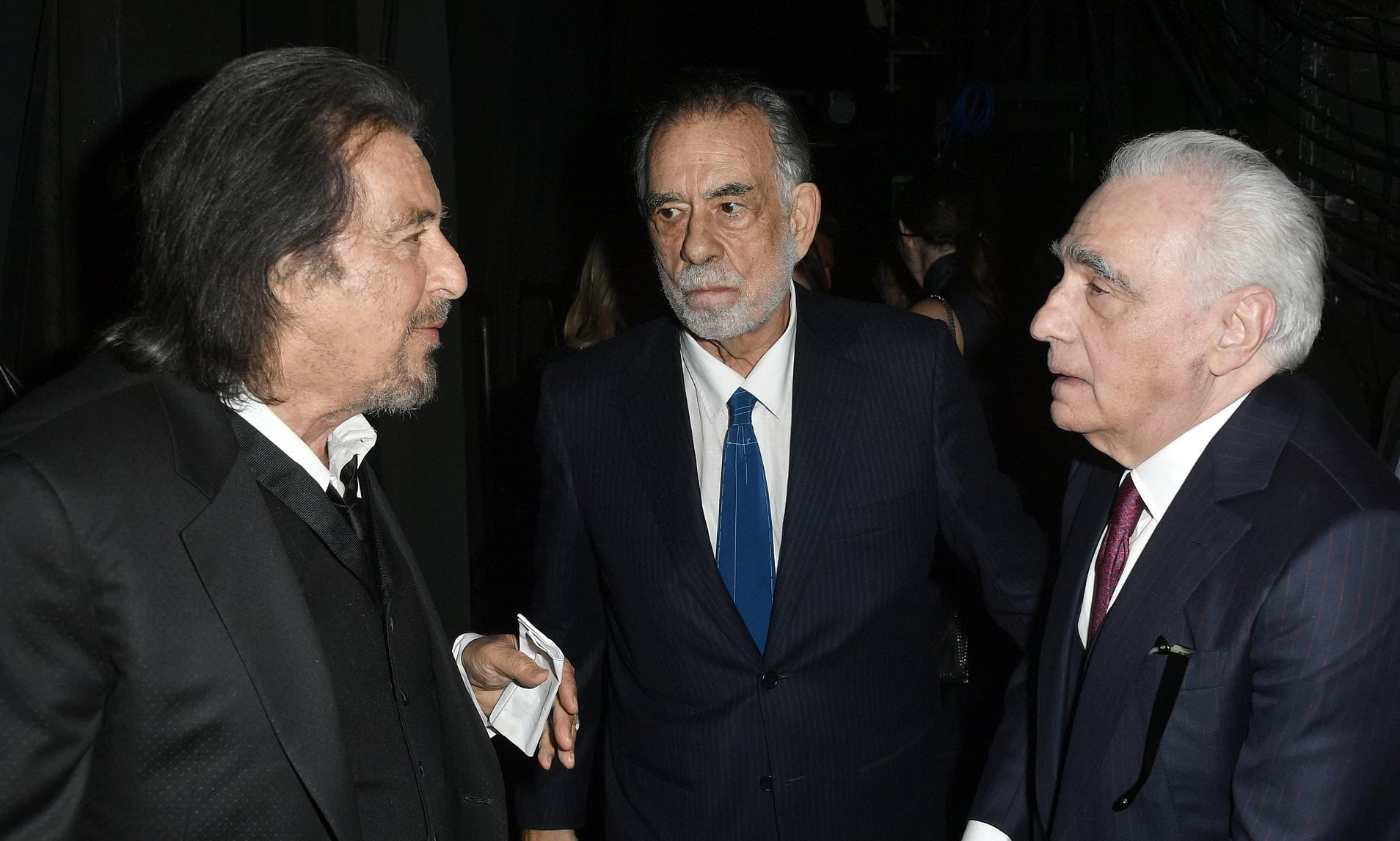 Photo Credit: Dua pembuat film paling ikonik di Hollywood dan salah satu aktornya yang paling terkenal Al Pacino, 79, Francis Ford Coppola, 80, dan Martin Scorsese, 76, mengobrol di belakang panggung di Penghargaan Film Hollywood Tahunan ke-23. GETTY IMAGES