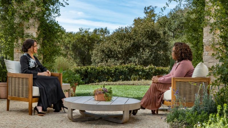 Meghan tidak berbicara dalam klip pertama dirilis untuk mempromosikan acara spesial yang dipandu Oprah Winfrey. Harpo Productions/Joe Pugliese