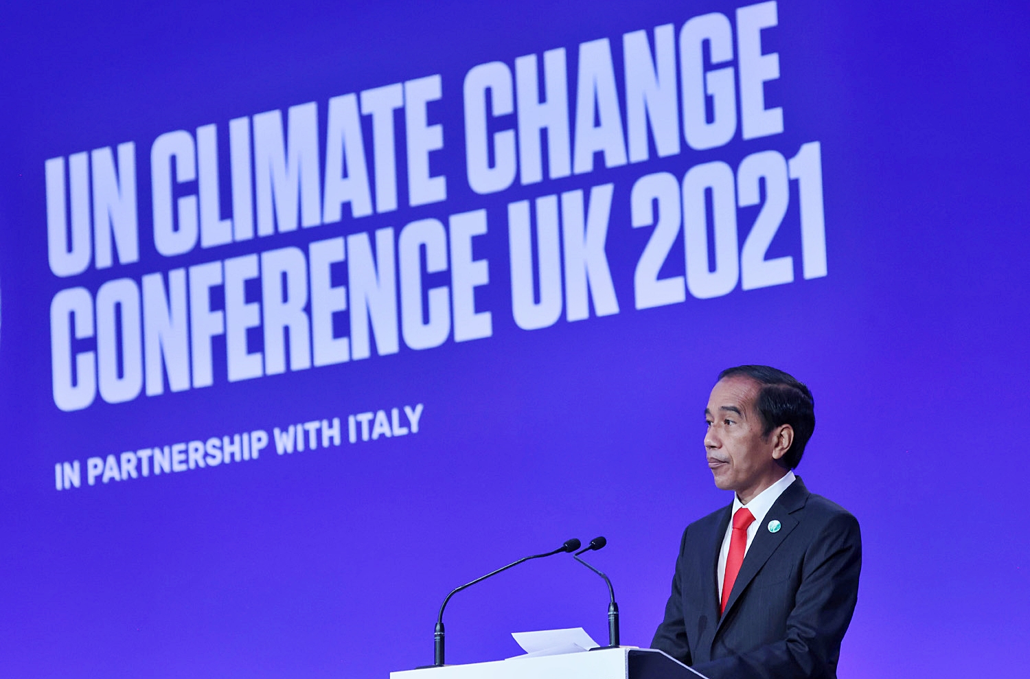 Photo Credit: Presiden Joko Widodo dalam Conference of the Parties ke-26 (COP26) United Nations Framework Convention on Climate Change (UNFCCC) di Glasgow, Skotlandia, 1 November 2021. REUTERS/Yves Herman